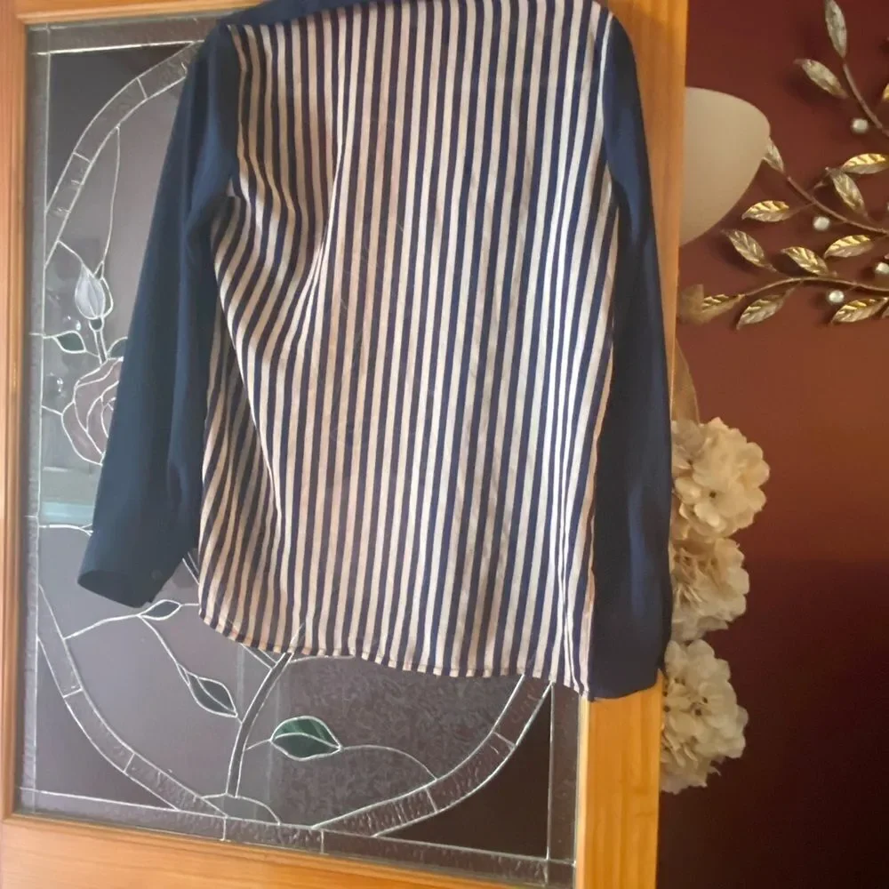Women’s sheer blouse by Ambiance Apparel